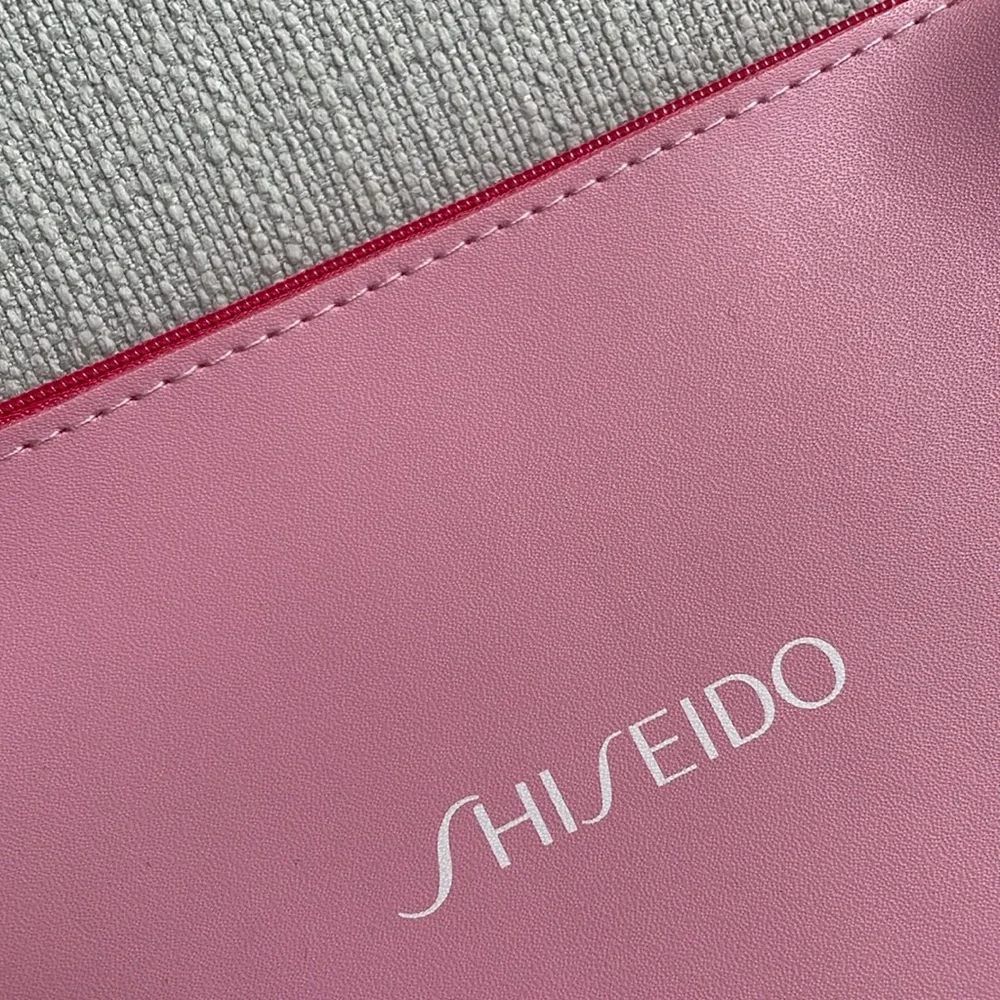 Shiseido pink cosmetics bag